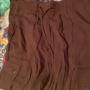 Brown drawstring waist cargo pants.